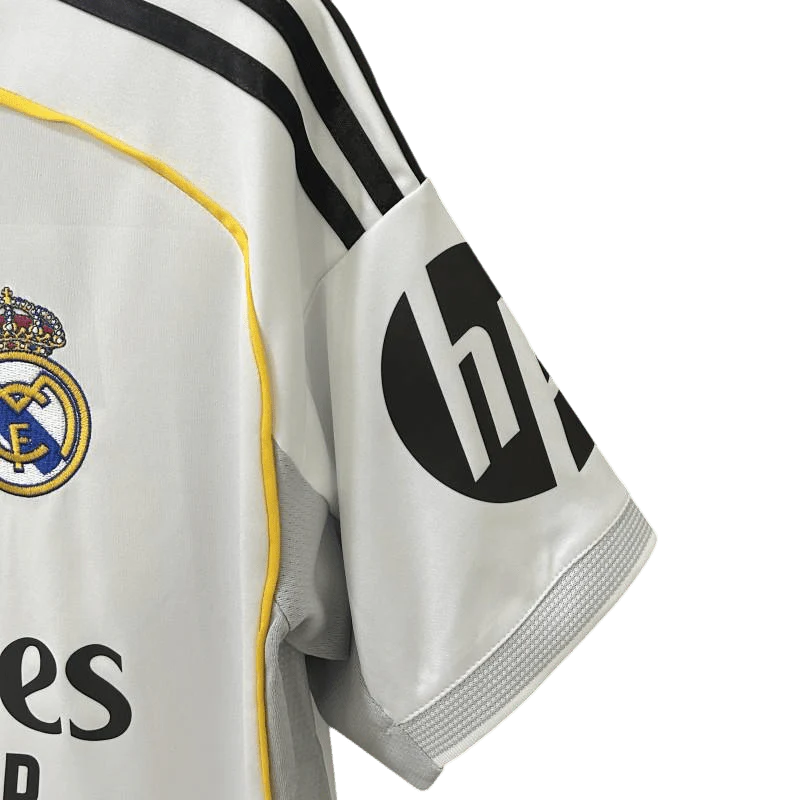 https://cdn.shopify.com/s/files/1/0826/7228/8075/files/20252026-real-madrid-emirates-fly-home-jersey-454745.webp?v=1749605802