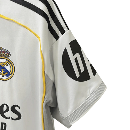https://cdn.shopify.com/s/files/1/0826/7228/8075/files/20252026-real-madrid-emirates-fly-home-jersey-454745.webp?v=1749605802
