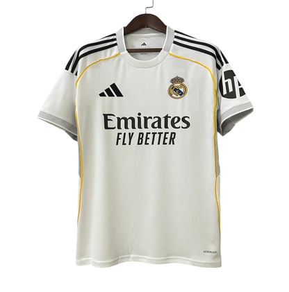 https://cdn.shopify.com/s/files/1/0826/7228/8075/files/20252026-real-madrid-emirates-fly-home-jersey-669984.webp?v=1749605803
