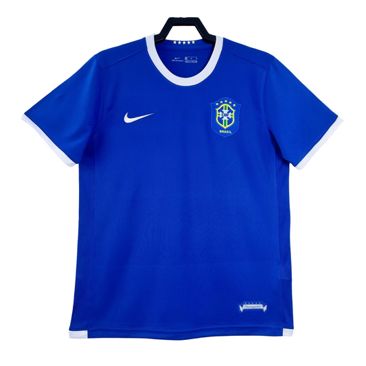 https://cdn.shopify.com/s/files/1/0891/1768/8155/files/Brazil_away_shirt_2006.png?v=1740564355