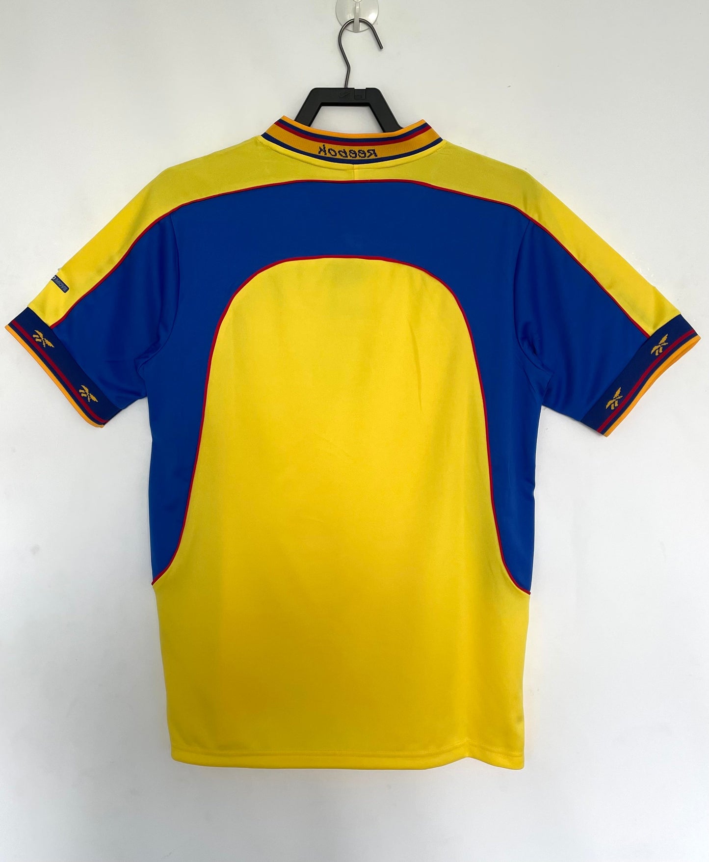 https://cdn.shopify.com/s/files/1/0891/1768/8155/files/Colombiahomeshirt-2001-back.jpg?v=1740564389
