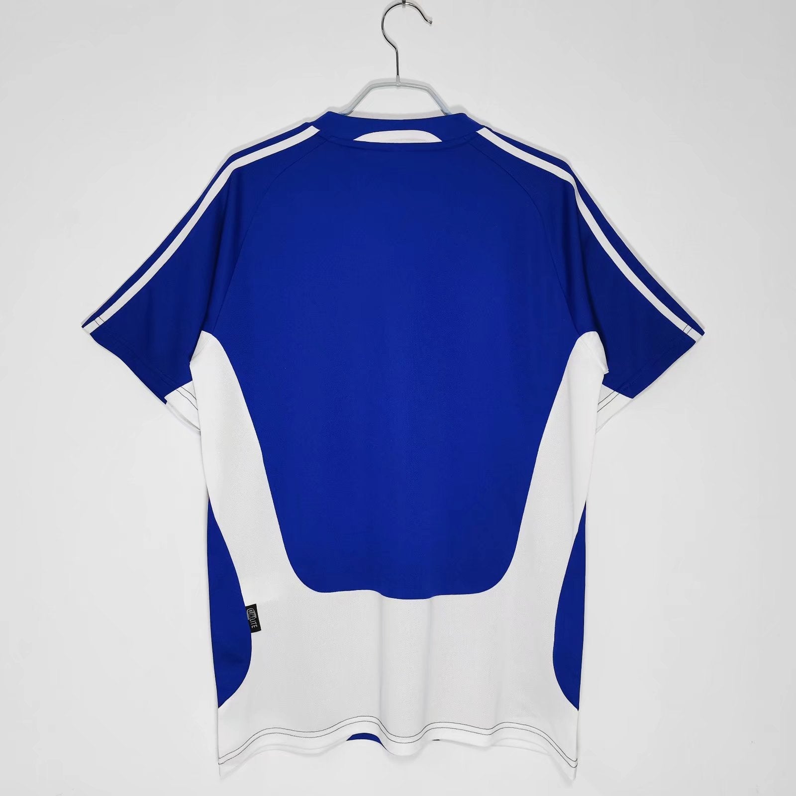 https://cdn.shopify.com/s/files/1/0891/1768/8155/files/GreeceHomeShirt2004-back.jpg?v=1741964977