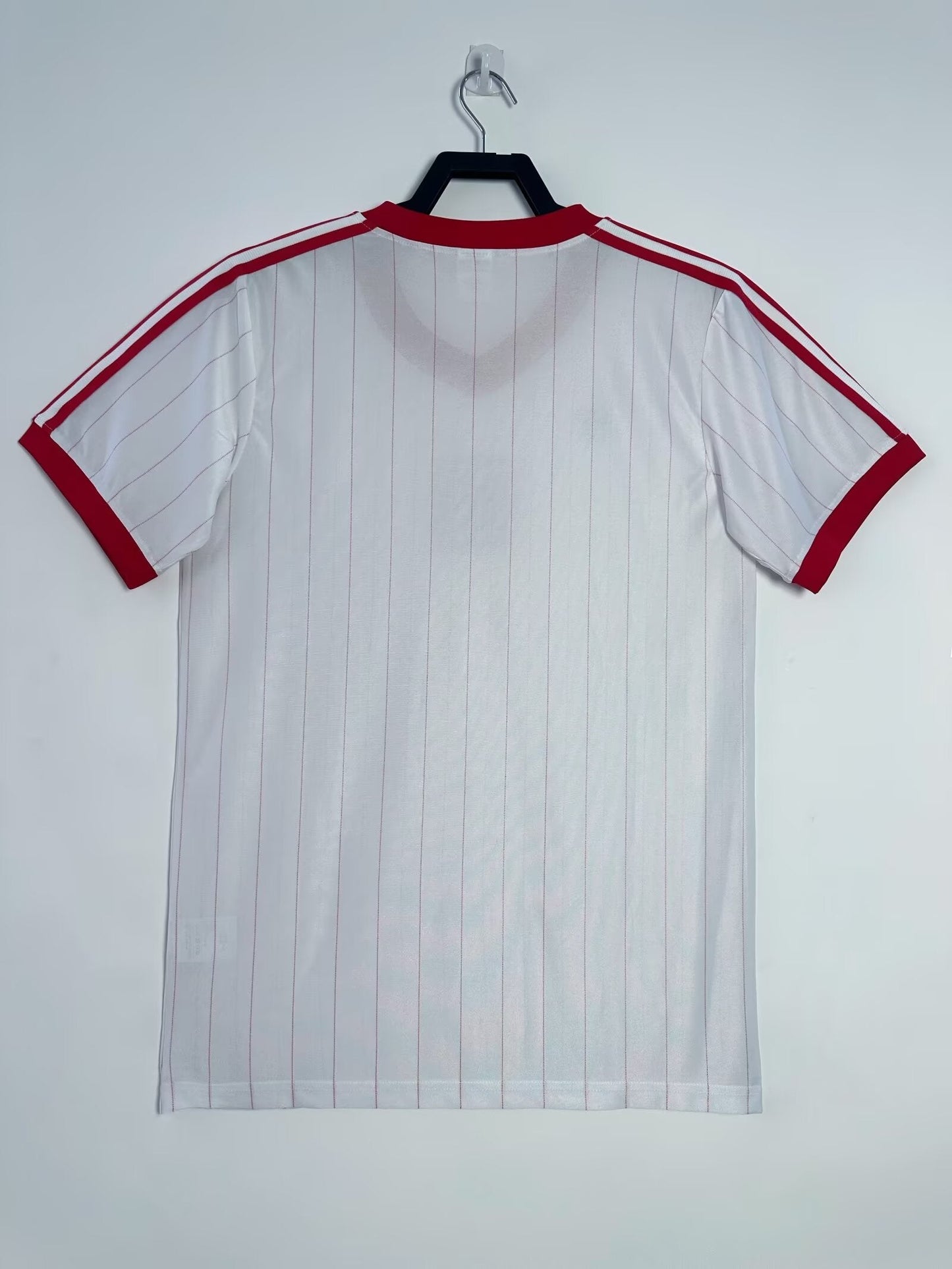 https://cdn.shopify.com/s/files/1/0891/1768/8155/files/Polandhomeshirt-1982-back.jpg?v=1740564364