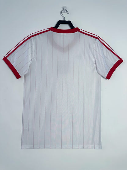 https://cdn.shopify.com/s/files/1/0891/1768/8155/files/Polandhomeshirt-1982-back.jpg?v=1740564364