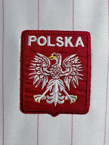 https://cdn.shopify.com/s/files/1/0891/1768/8155/files/Polandhomeshirt-1982-logo.jpg?v=1740564364