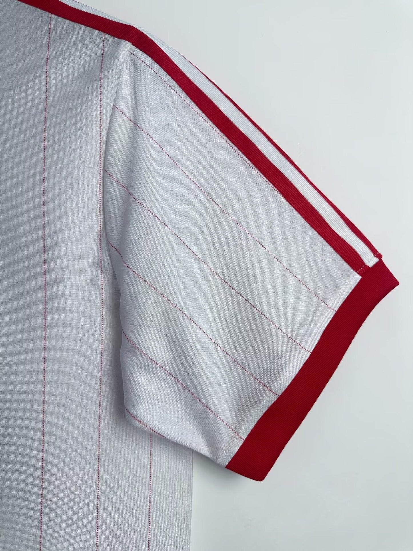 https://cdn.shopify.com/s/files/1/0891/1768/8155/files/Polandhomeshirt-1982-sleeve.jpg?v=1740564364