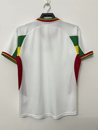 https://cdn.shopify.com/s/files/1/0891/1768/8155/files/SenegalHomeShirt-2002-back.jpg?v=1740564468