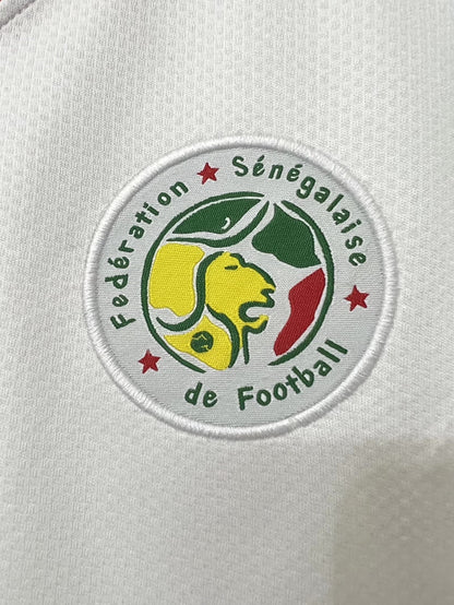 https://cdn.shopify.com/s/files/1/0891/1768/8155/files/SenegalHomeShirt-2002-logo.jpg?v=1740564467