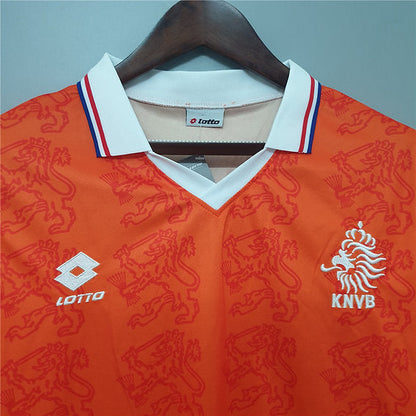 https://cdn.shopify.com/s/files/1/0891/1768/8155/files/The_Netherlands_Home_Shirt_-_1994_-_detail.jpg?v=1740564713