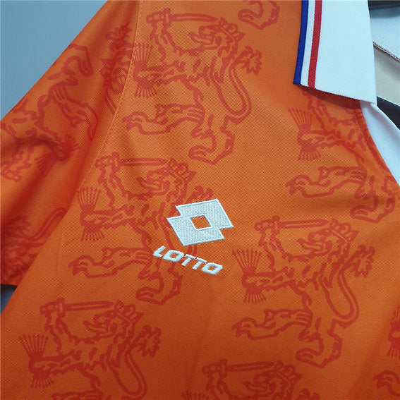 https://cdn.shopify.com/s/files/1/0891/1768/8155/files/The_Netherlands_Home_Shirt_-_1994_-_logo.jpg?v=1740564713